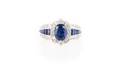 An 18 Karat White Gold Diamond and Sapphire Ring