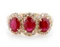 A 14 Karat Yellow Gold Diamond and Ruby Ring