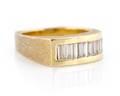 An 18 Karat Yellow Gold and Diamond Ring