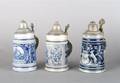 A Group of Three German Salt Glaze and Pewter Mounted Steins