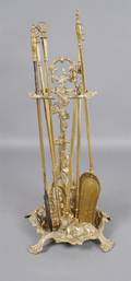 A Brass Louis XV Style Fire tools Stand