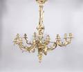 A Louis XV Style Gilt Bronze TwelveLight Chandelier