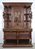 An American Renaissance Walnut Carved Cupboard
