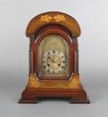 A Continental Mahogany and Marquetry Mantel Clock