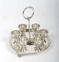 An English Silverplate SixCup Egg Cruet Stand Elkington