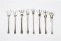 A Group of Seven American Sterling Silver Lettuce Forks