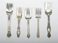 A Group of Five American Sterling Serving Forks
