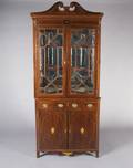 A Federal Mahogany and Inlaid Corner Cabinet