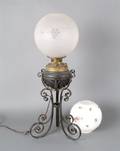 A Victorian Cast Metal Fluid Lamp