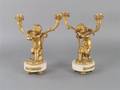 A Pair of TwoLight Figural Candelabras