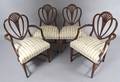 A Set of Ten Hepplewhite Style Dining Chairs