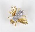 An 18 Karat Yellow Gold Ruby and Diamond Bee Pin