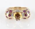 A 14 Karat Yellow Gold Citrine Ruby and Diamond Ring