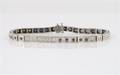 A White Gold Synthetic Sapphire and Diamond Line Bracelet