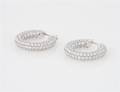 A Pair of 18 Karat White Gold and Diamond Earrings
