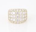 An 18 Karat Yellow Gold and Diamond Ring