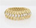 An 18 Karat Yellow Gold and Diamond Bracelet