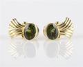 A Pair of 18 Karat Yellow Gold and Peridot Ear Clips