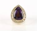 An 18 Karat Yellow Gold Amethyst and Diamond Ring