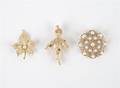 Three 14 Karat Yellow Gold Brooches