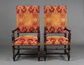 PAIR OF RENAISSANCE STYLE CARVED WALNUT HALL CHAIRS