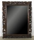 A Carved Walnut Mirror
