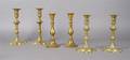 Three Pairs of English Brass Candlesticks