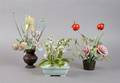 A Group of Three Flower Arrangements