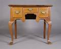 A George III Walnut Lowboy