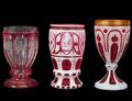 GROUP OF THREE OVERLAY GLASS GOBLETS