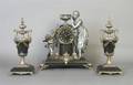 A Victorian Slate and Cast Metal Figural Clock Garniture