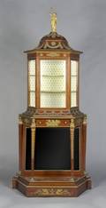 A Louis XVI Style Gilt Metal Mounted Vitrine
