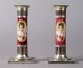 A Pair of Pairpoint Ceramic and Silvered Metal Candlesticks