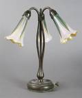 A Tiffany Studios Bronze ThreeLight Lily Lamp