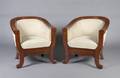 A Pair of Danish Barrel Back Chairs