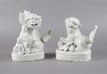 A Pair of Chinese Blanc de Chine Foo Dogs