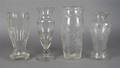 A Collection of Four Cut and Etched Glass Vases