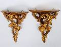 TWO CARVED AND GILTWOOD BRACKETS
