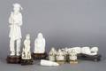 A Group of Nine Carved Asian Ivory Figures