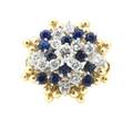 A 14 Karat White and Yellow Gold Sapphire and Diamond Ring