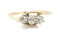 A 14 Karat Yellow Gold and Diamond Ring