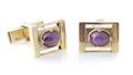 A Pair of Yellow Gold and Synthetic Star Ruby Cufflinks