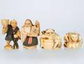 GROUP OF FOUR CARVED IVORY NETSUKE