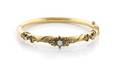 A 14 Karat Yellow Gold and Opal Victorian Bangle Bracelet