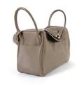An Hermes Grey Leather Lindy Bag