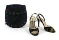 A Pair of Yves Saint Laurent Black Suede Shoes with Matching Purse