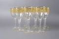 A Set of Ten Gilt Glass Wine Stems