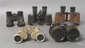 A Collection of Five Pairs of Binoculars