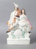 A Staffordshire Flatback Figural Group