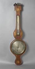 A Victorian Mahogany and Inlaid Wheel Barometer